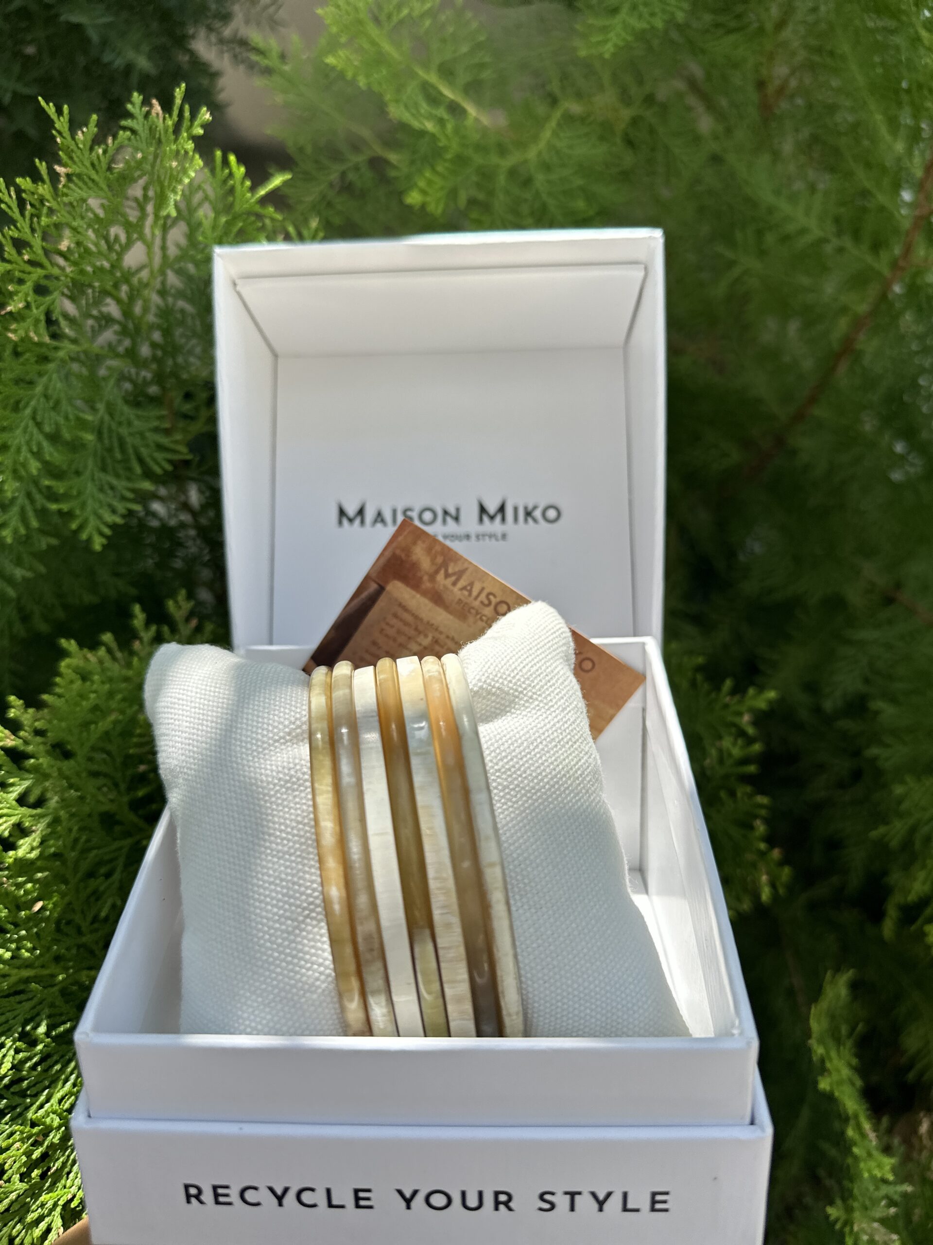 ivory-natural-buffalo-horn-bangles-set-of-7-maison-miko-1 Handcrafted ivory and natural buffalo horn bangles set of 7 by Maison Miko.